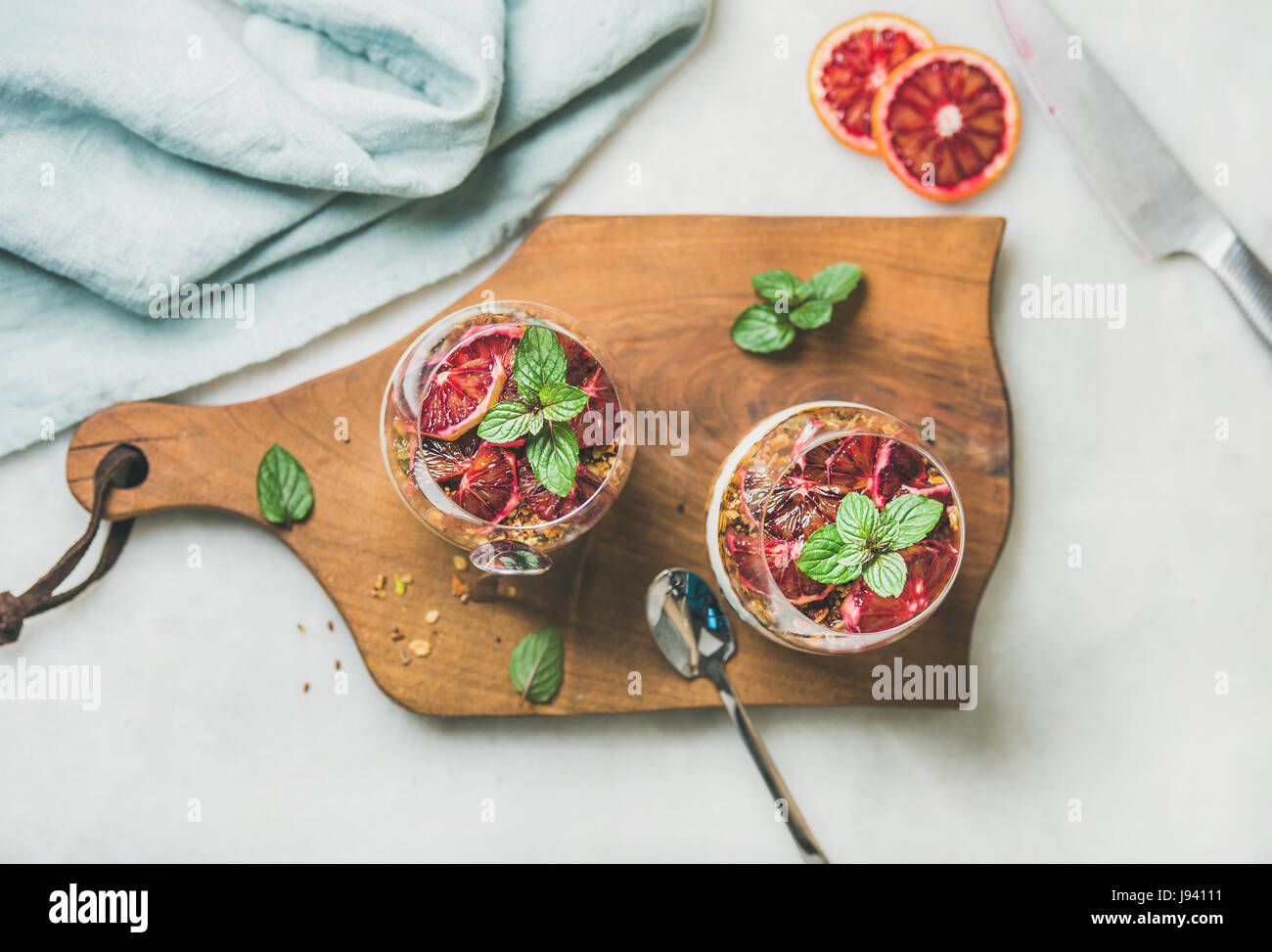 Healthy breakfast. Greek yogurt, granola, blood orange layered parfait
