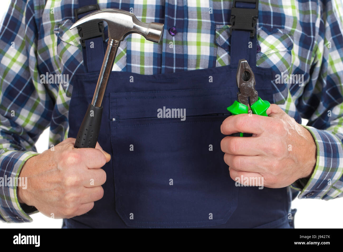 Close up picture of an engineer holding a hammer and a claw Stock Photo