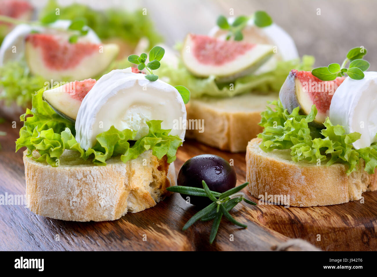 Finger food with goat cheese and figs on ciabatta bread Stock Photo Alamy