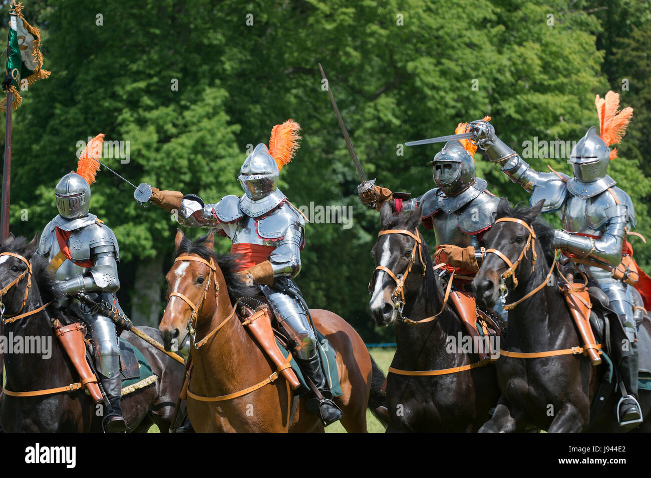 English civil war knights on horseback with swords at a Sealed knot reenactment event. Charlton Park, Malmesbury, Wiltshire, UK Stock Photo