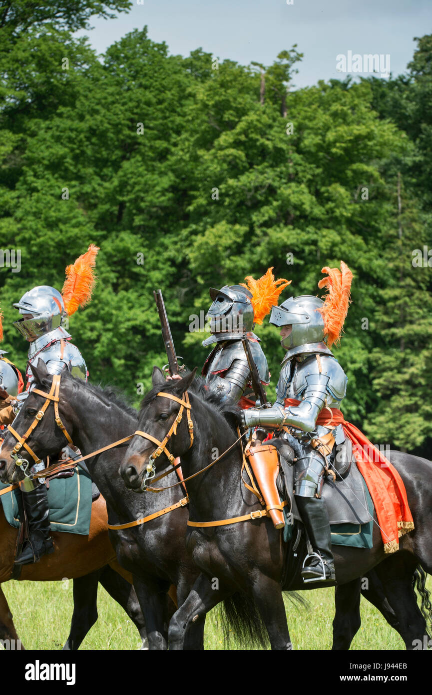 English civil war knights on horseback with pistols at a Sealed knot reenactment event. Charlton Park, Malmesbury, Wiltshire, UK Stock Photo