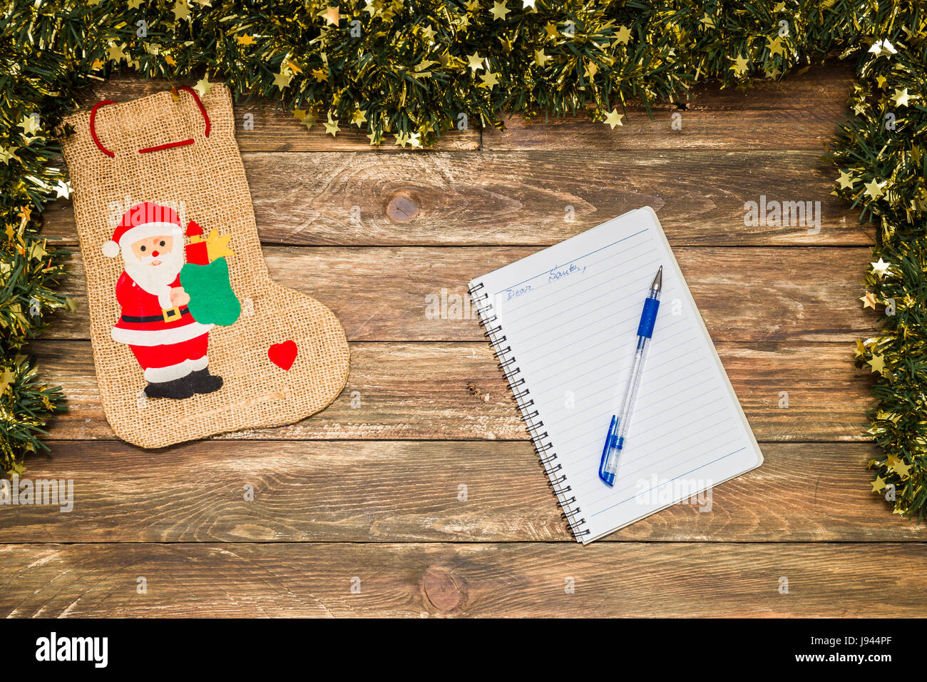 christmas background with santa and notebook Stock Photo - Alamy