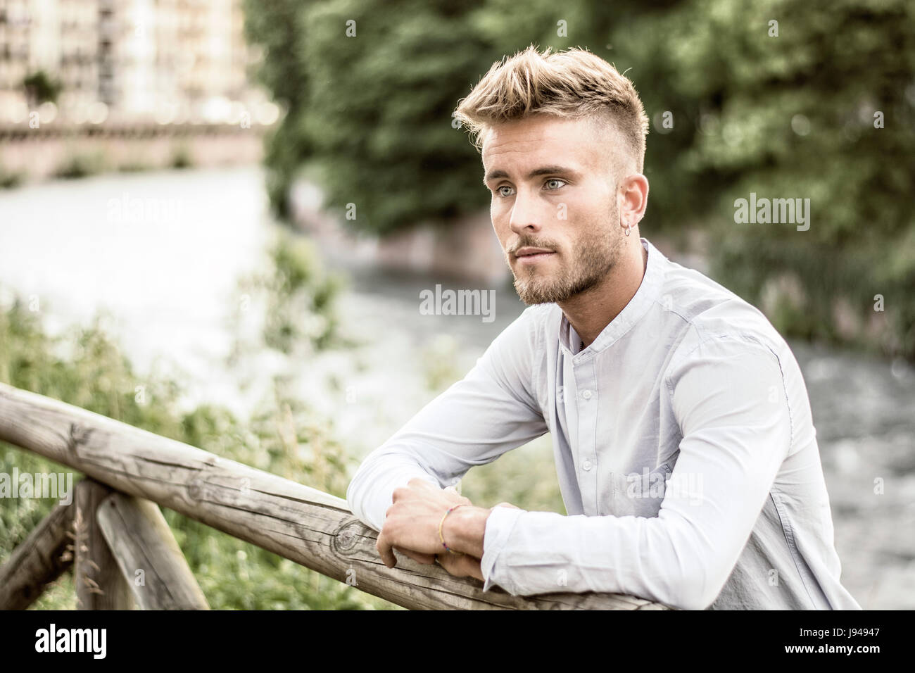 Blond hair blue eyed young man hi-res stock photography and images - Alamy
