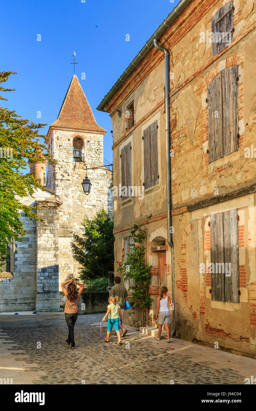 France, Tarn et Garonne, Auvillar, labelled Les Plus Beaux Villages de France, Saint Pierre street and Saint Pierre church Stock Photo