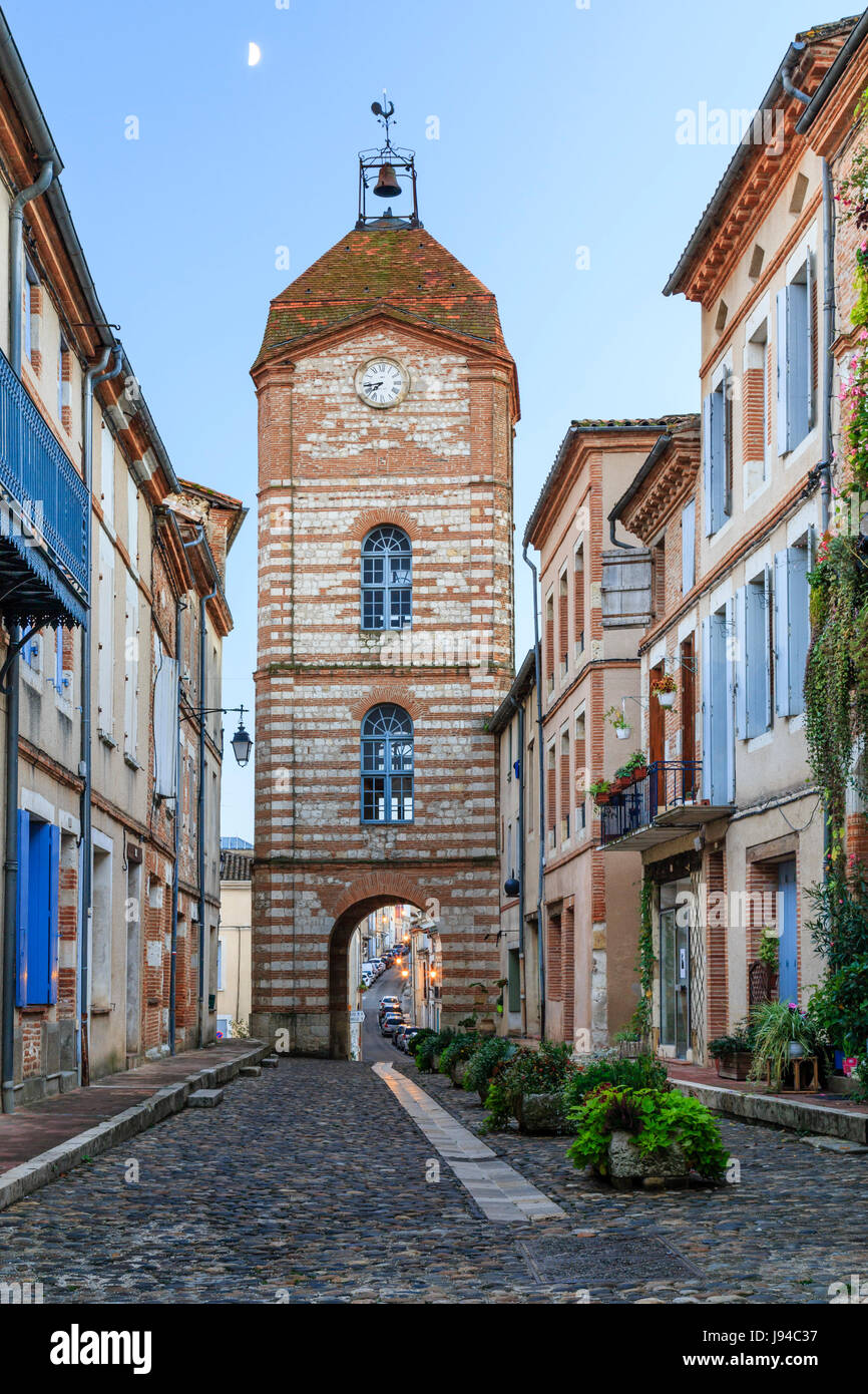 France, Tarn et Garonne, Auvillar, labelled Les Plus Beaux Villages de France (The Most beautiful Village of France), Horloge street and Clock Tower Stock Photo