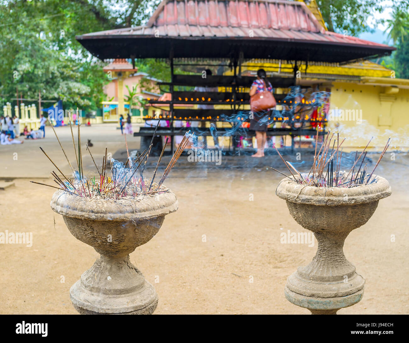 Burning aroma sticks creates unique atmosphere in the Gatambe temple