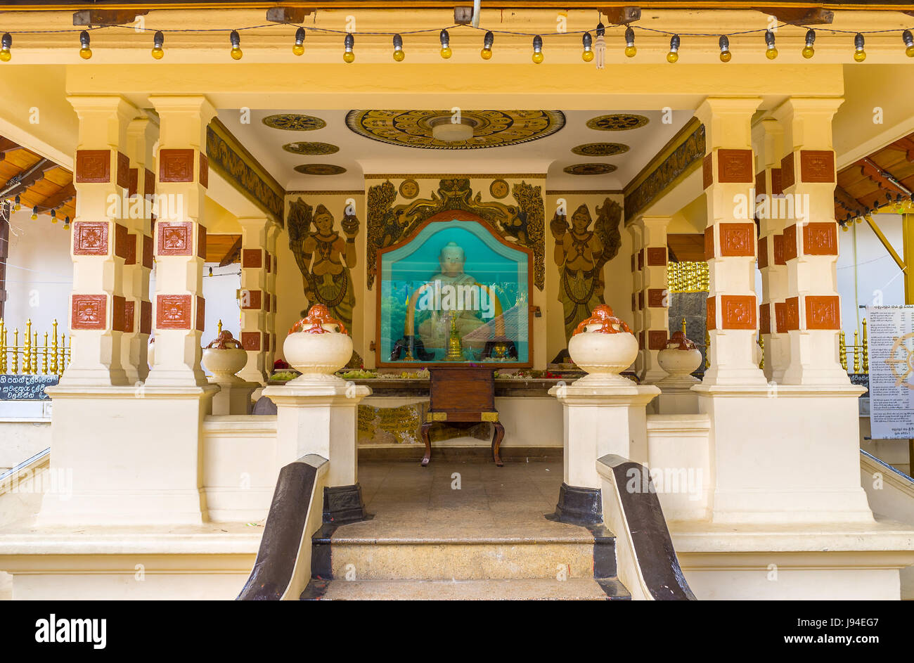 KANDY, SRI LANKA - NOVEWMBER 28, 2016: The interior of small temple adjacent to Vel Bodhiya on the territory of Natha Devale, on November 28 in Kandy. Stock Photo