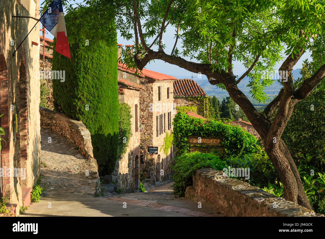 France, Pyrenees Orientales, Castelnou, labelled Les Plus Beaux Villages de France (The Most beautiful Village of France), street in the village Stock Photo