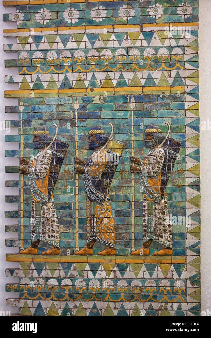 Three warriors on the Ishtar gates of Babylon build by King Nebukadnezar II, 604-562 BC. Stock Photo