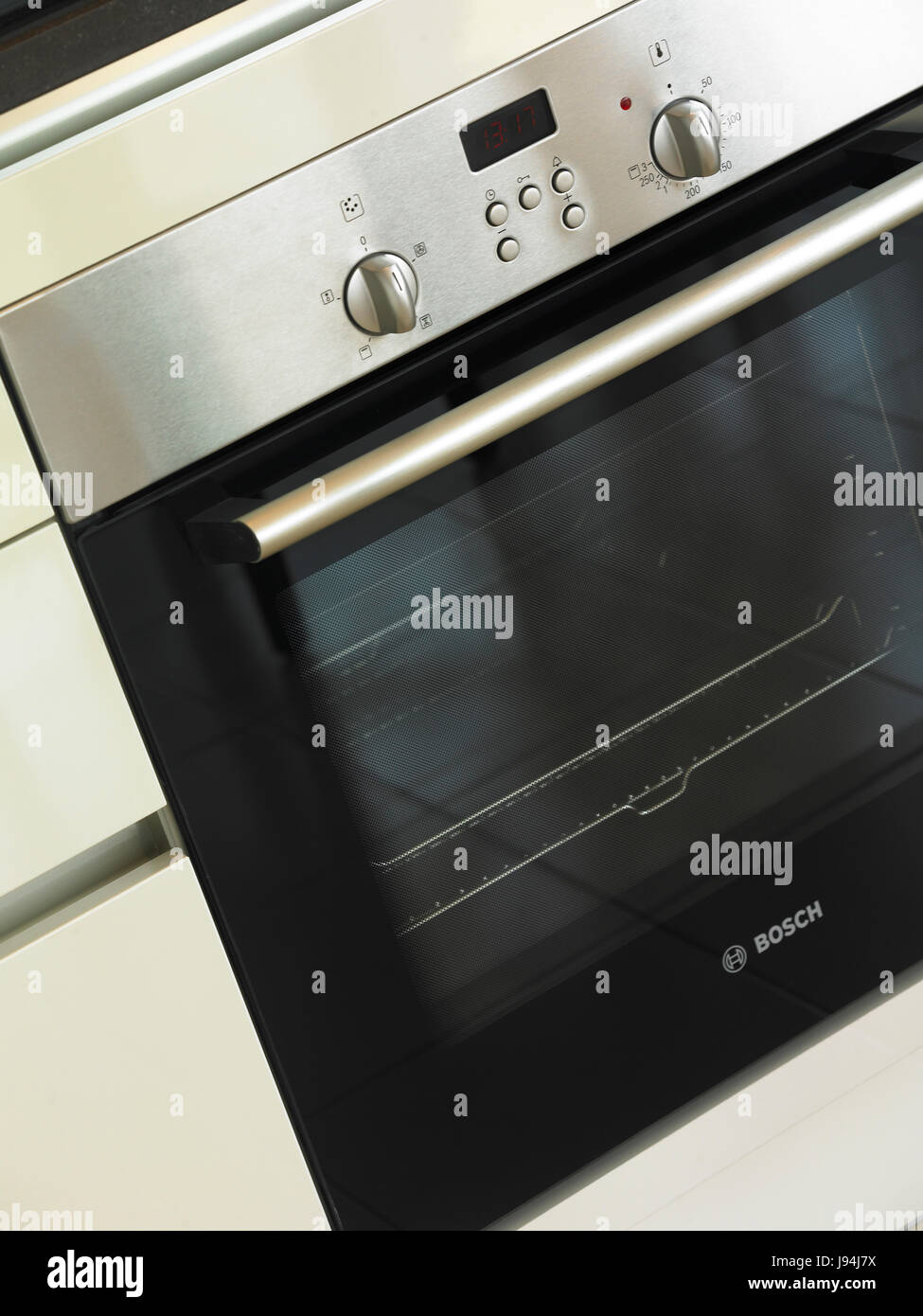 Cooker and oven hob in kitchen Stock Photo Alamy