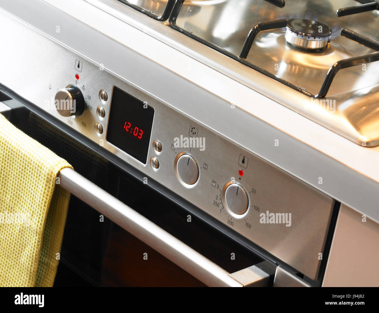 Cooker and oven hob in kitchen Stock Photo Alamy