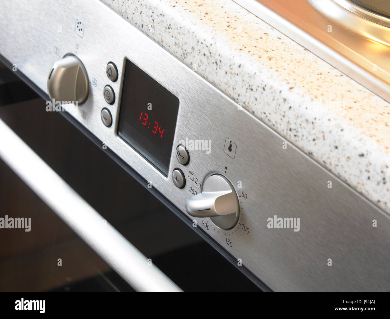 Cooker and oven hob in kitchen Stock Photo Alamy