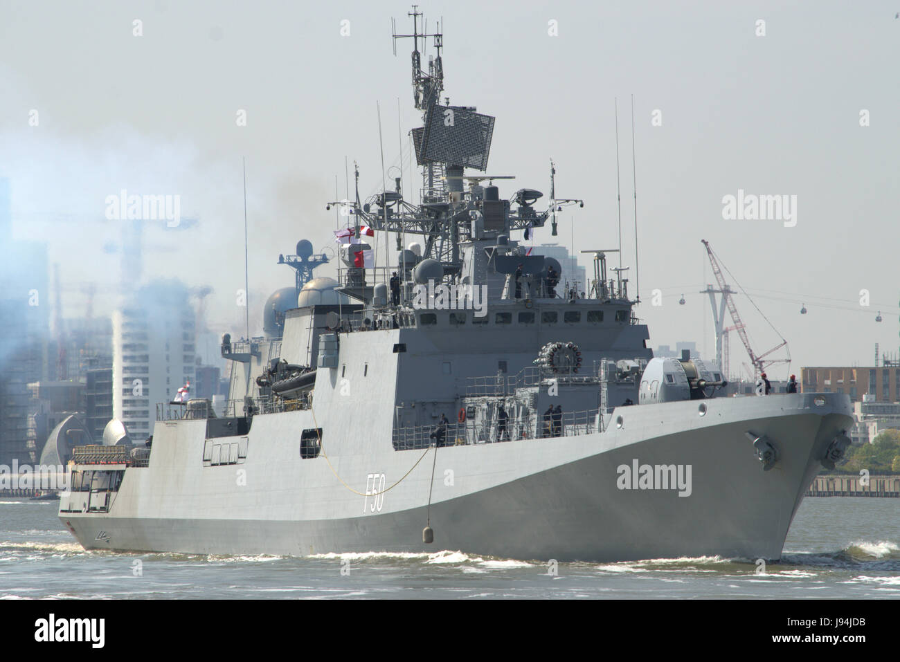 Indian Naval Vessel INS Tarkash F50 heads down the river Thames after paying a goodwill visit to London Stock Photo