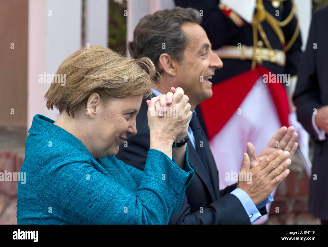 French President Nicolas Sarkozy and German Chancellor Angela Merkel are pictured together at the beginning of the G8 summit in Deauville, Germany, 26 May 2011. The G8 summit takes place between 26 and 27 May 2011. Photo: PEER GRIMM | usage worldwide Stock Photo