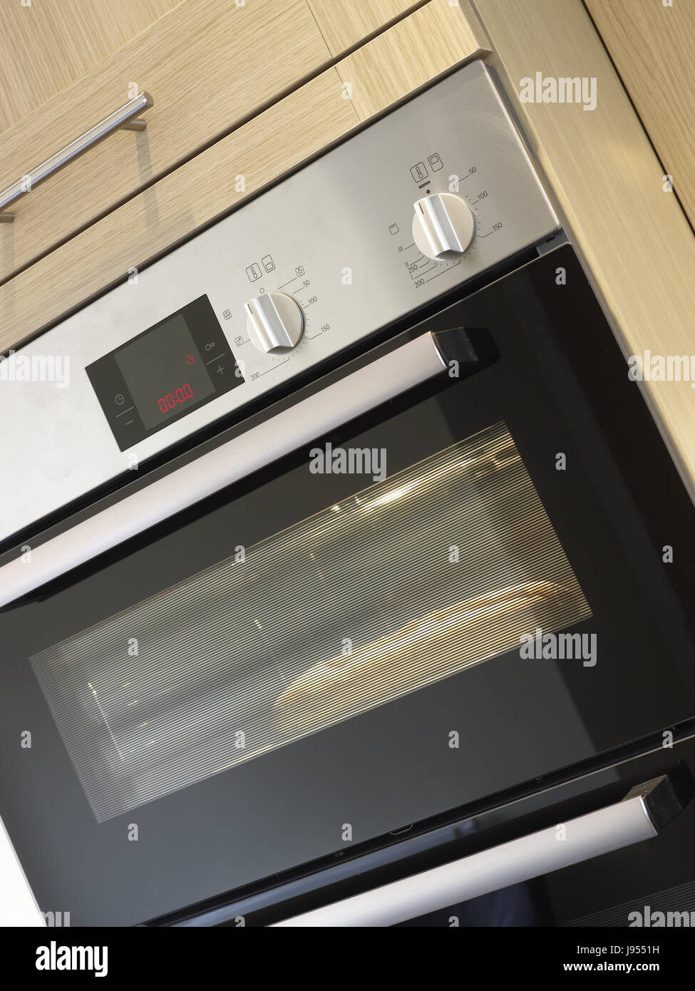 Cooker and oven hob in kitchen Stock Photo Alamy