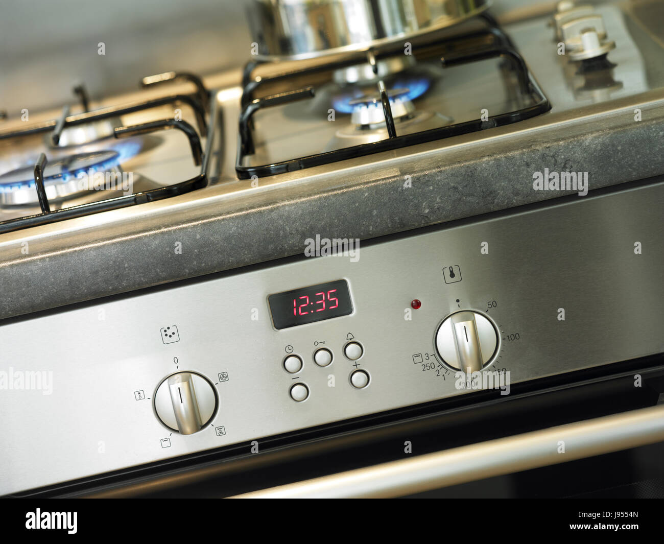 Cooker and oven hob in kitchen Stock Photo Alamy