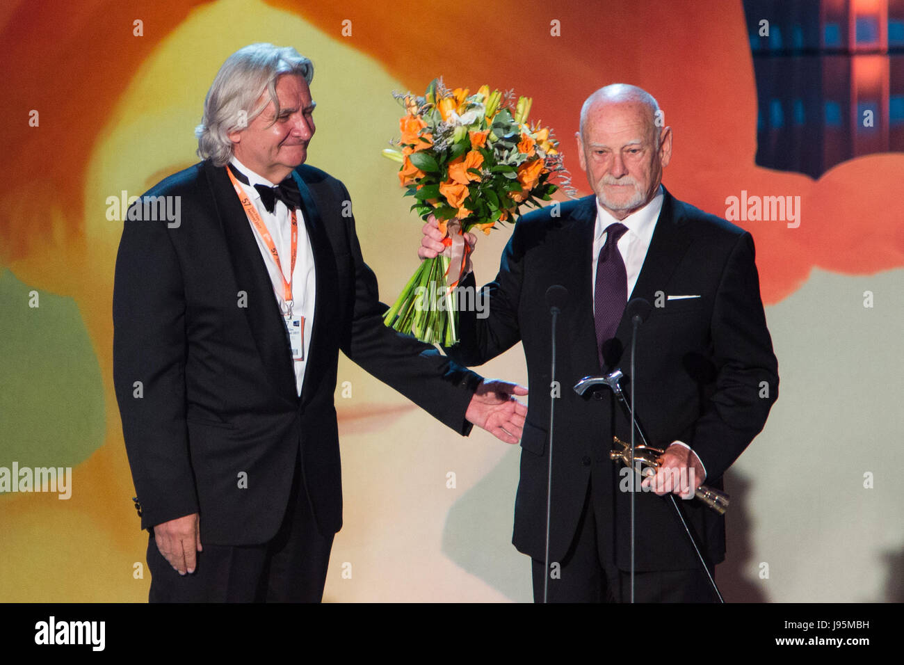 Zlin, Czech Republic. 02nd June, 2017. Czech artist and costume designer Theodor Pistek, 84, right, Oscar winner for his costumes in Milos Forman's film Amadeus (1984), received the Golden Slipper for outstanding contribution to cinematography for children and youth at the 57th International Film Festival for Children and Youth in Zlin, Czech Republic, June 2, 2017. At left: Festival's President Cestmir Vancura. Credit: Josef Omelka/CTK Photo/Alamy Live News Stock Photo