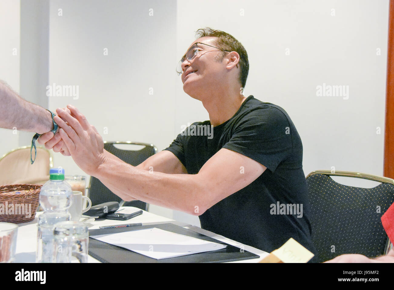 Bonn, Germany. 4th Jun, 2017. Mark Dacascos  (Hawaii Five-0, Marvel’s Agents of S.H.I.E.L.D.) meeting fans at FedCon. FedCon 26, Europe's biggest Star Trek Convention, invites  celebrities and fans to meet each other in signing sessions and panels. FedCon 26 took place Jun 2-5 2017. Credit: Markus Wissmann/Alamy Live News Credit: Markus Wissmann/Alamy Live News Stock Photo