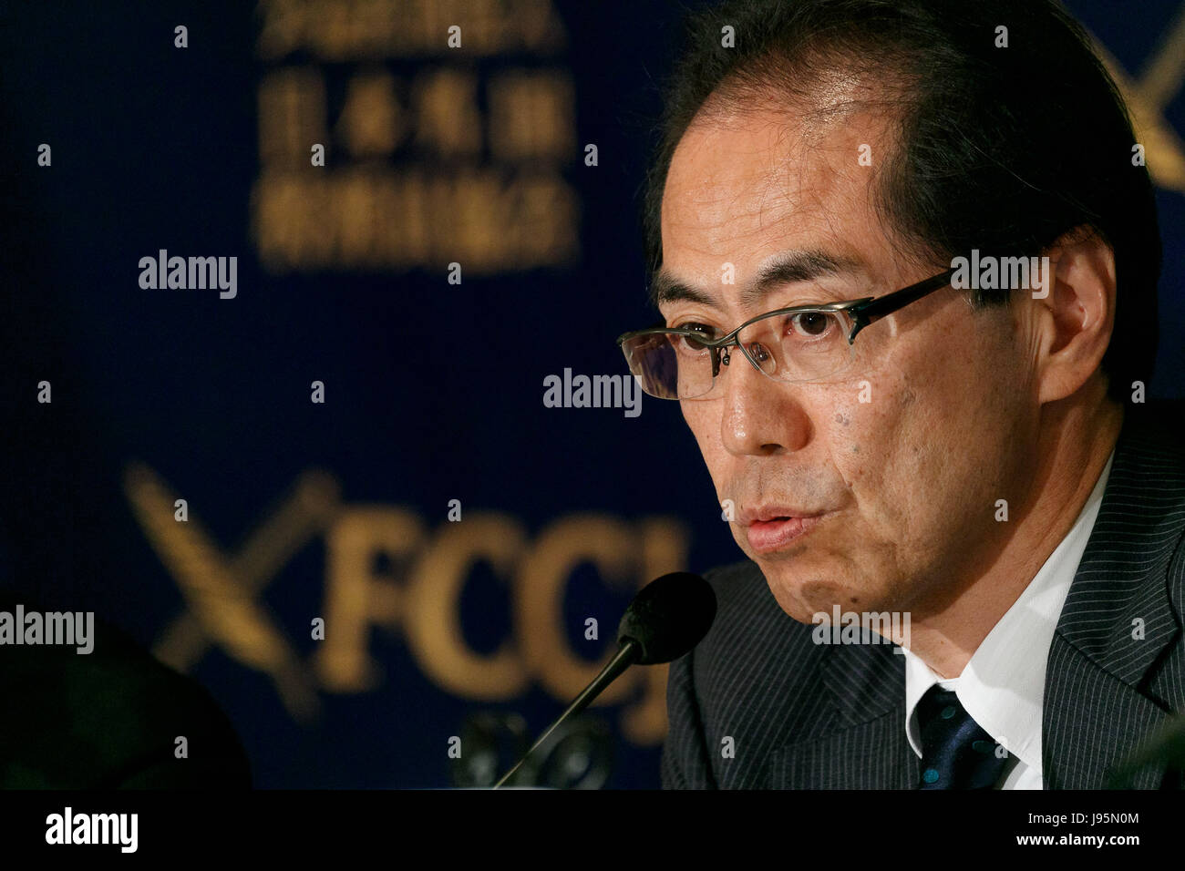 Shigeaki Koga speaks during a news conference at the Foreign Correspondents' Club of Japan on