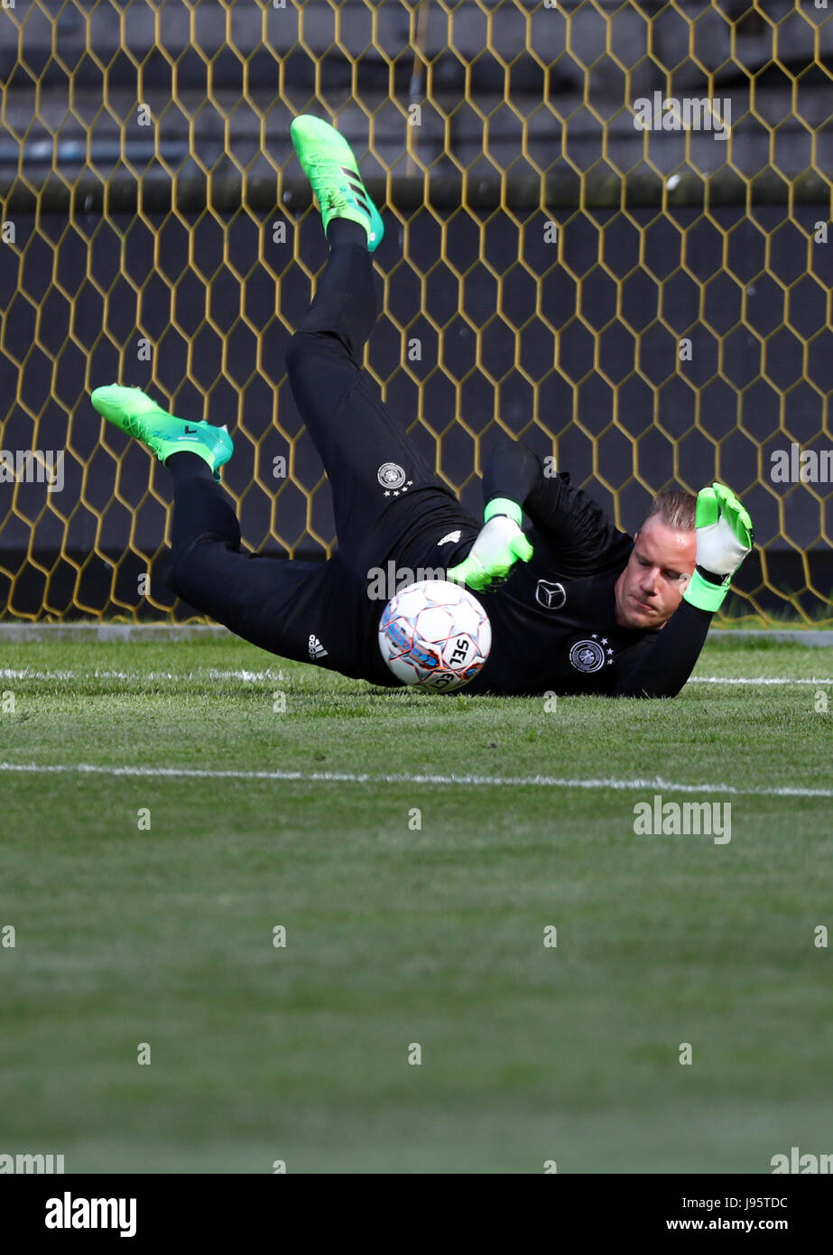 Germany goalie Marc-Andre ter Stegen catches the ball at a training session, ahead of the Denemark vs. Germany friendly soccer match, at the Brondby Stadion in Copenhagen, Denmark, 5 June 2017. Photo: Christian Charisius/dpa Stock Photo