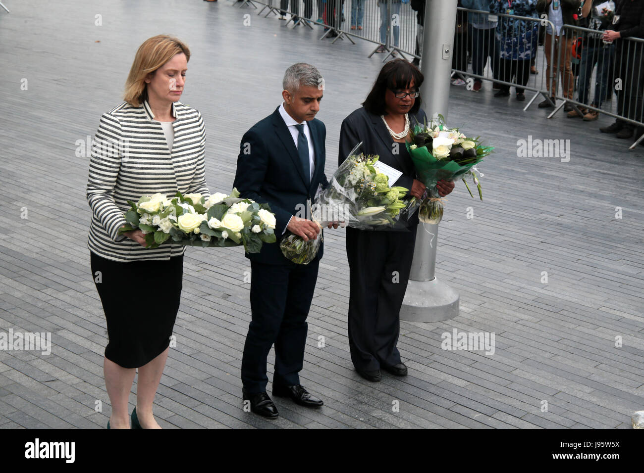 London, UK. 05th June, 2017. A vigil took place by Potters Field to remember those who died in the terror attack of Saturday in Borough High Street, floral tributes were lay by Amber Rudd home secretary, Diana Abbott MP for Hackney and Sadi Khan  Credit: Paul Quezada-Neiman/Alamy Live News Stock Photo