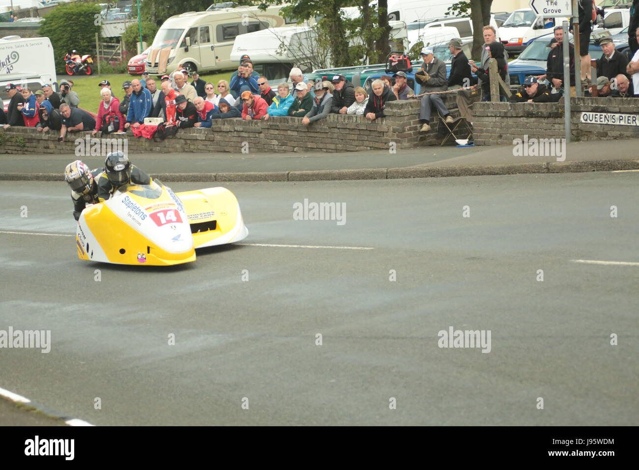Ramsey, UK. 5th Jun, 2017. Isle of Man TT Races, Sure Sidecar Race. Number 14, John Saunders and Frank Claeys of the Stapletons Tyre Services team from Leeds, UK on their 600cc Shelbourne Honda sidecar at Cruickshanks Corner, Ramsey, Isle of Man. Credit: Louisa Jane Bawden/Alamy Live News. Stock Photo