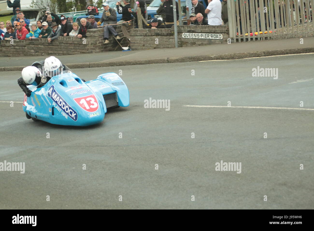 Ramsey, UK. 5th Jun, 2017. Isle of Man TT Races, Sure Sidecar Race. Number 13 Robert Handcock and Ken Edwards from the Maddockhire/Portable Energy Team of forest of Dean on a 600cc Baker Honda sidecar at Cruickshanks Corner, Ramsey, Isle of Man. Credit: Louisa Jane Bawden/Alamy Live News. Stock Photo