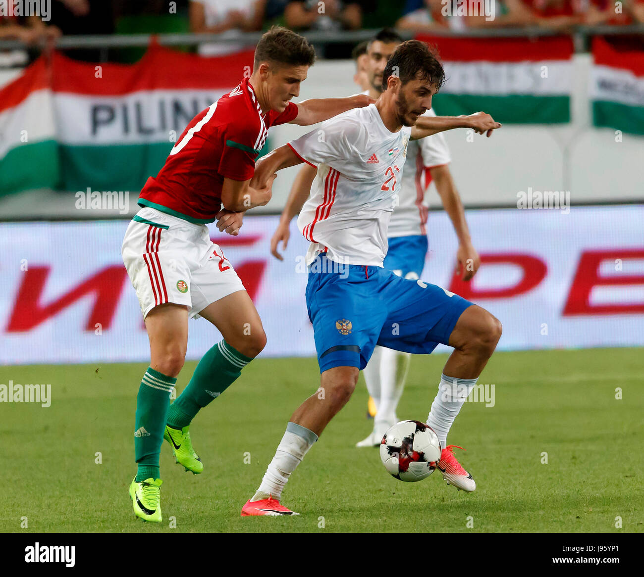 Budapest, Hungary. 05th June, 2017. BUDAPEST, HUNGARY - JUNE 5: Aleksandr Erokhin #21 of Russia wins the ball from Roland Sallai (L) of Hungary during the International Friendly match between Hungary and Russia at Groupama Arena on June 5, 2017 in Budapest, Hungary. Credit: Laszlo Szirtesi/Alamy Live News Stock Photo