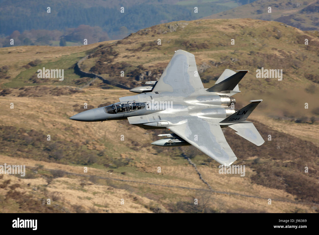 McDonnell Douglas F-15D Eagle low flying training in Wales UK Stock Photo
