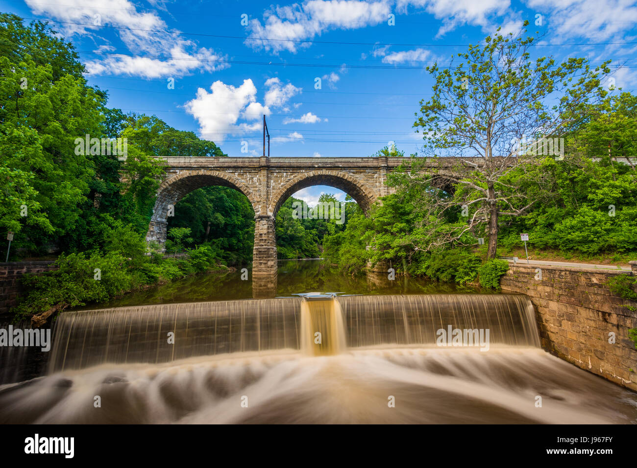 A dam on Wissahickon Creek and old railroad bridge, in Philadelphia