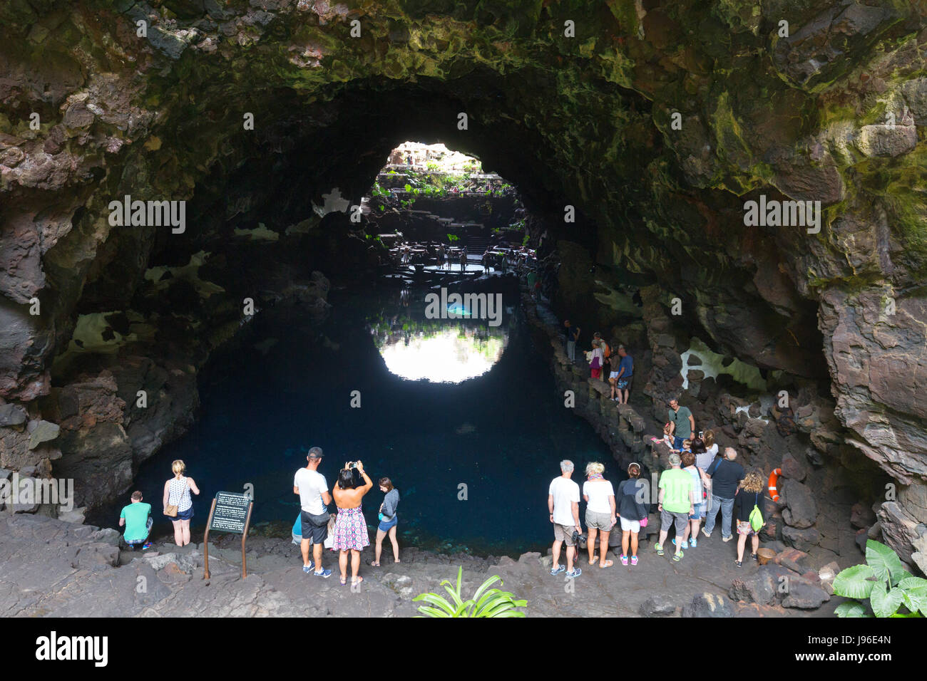 Lanzarote Jameos del Agua caves - tourists in the volcanic cave adapted by artist Cesar Manrique at Jameos del Agua, Lanzarote, Canary Islands Europe Stock Photo