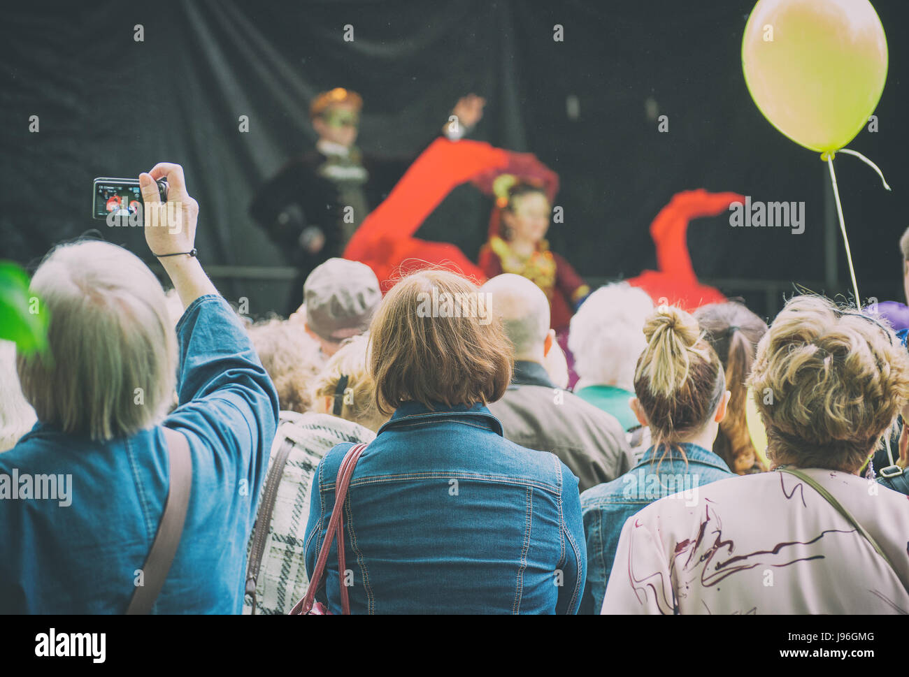 People watching live performance on stage Stock Photo Alamy