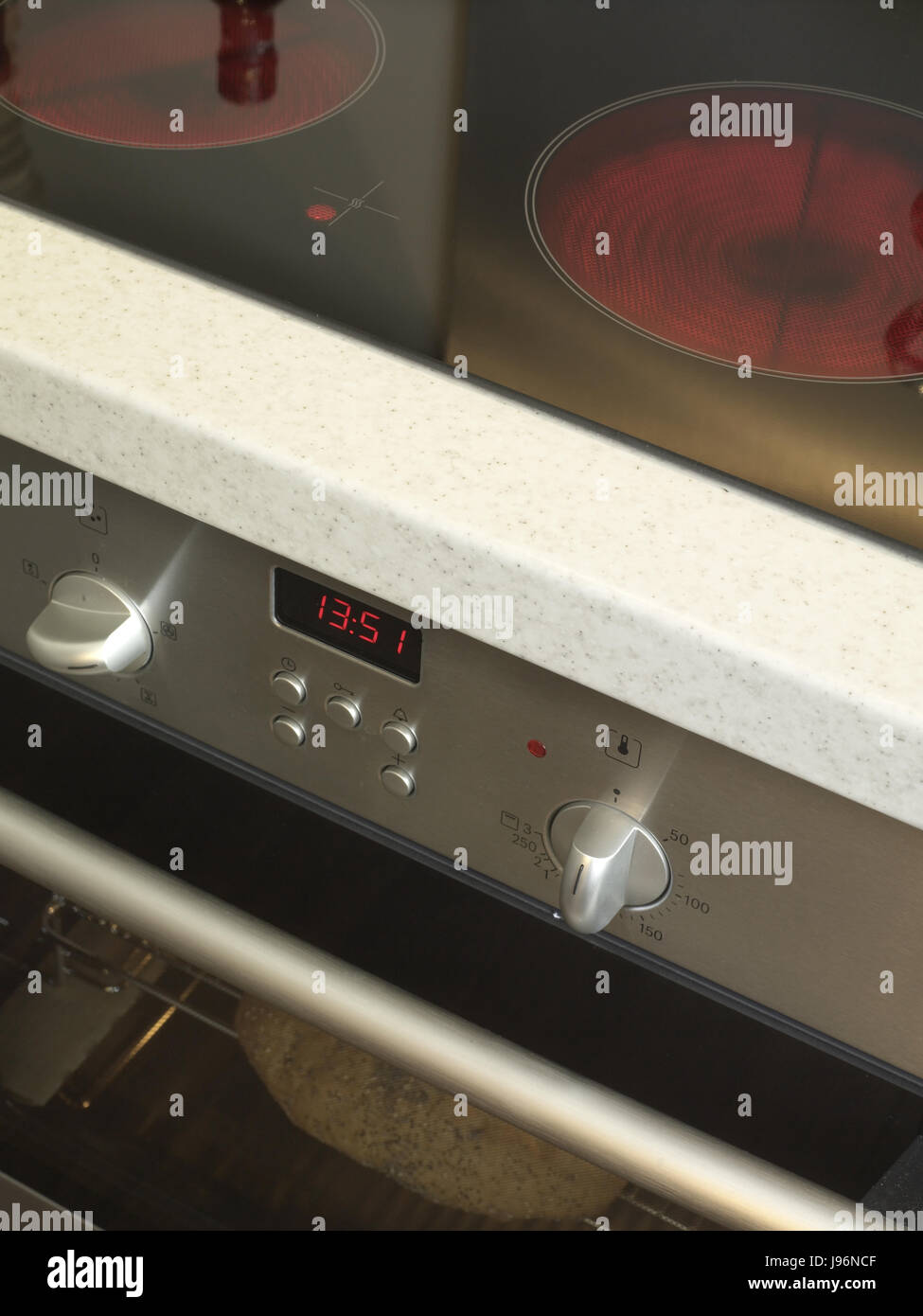 Cooker and oven hob in kitchen Stock Photo Alamy