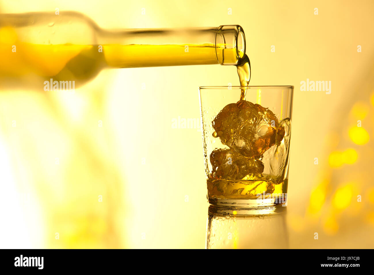 whiskey with ice cubes Stock Photo Alamy