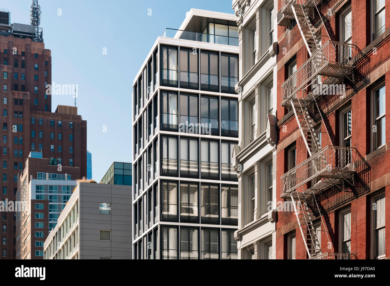 The upper floors of the building in the landmarked SoHo district. 27 Wooster Street, New York, United States. Architect: Kohn Pedersen Fox Associates Stock Photo