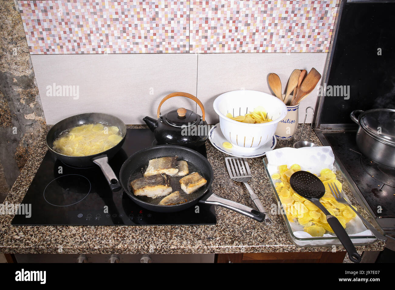 Cook fish in the pan Stock Photo Alamy