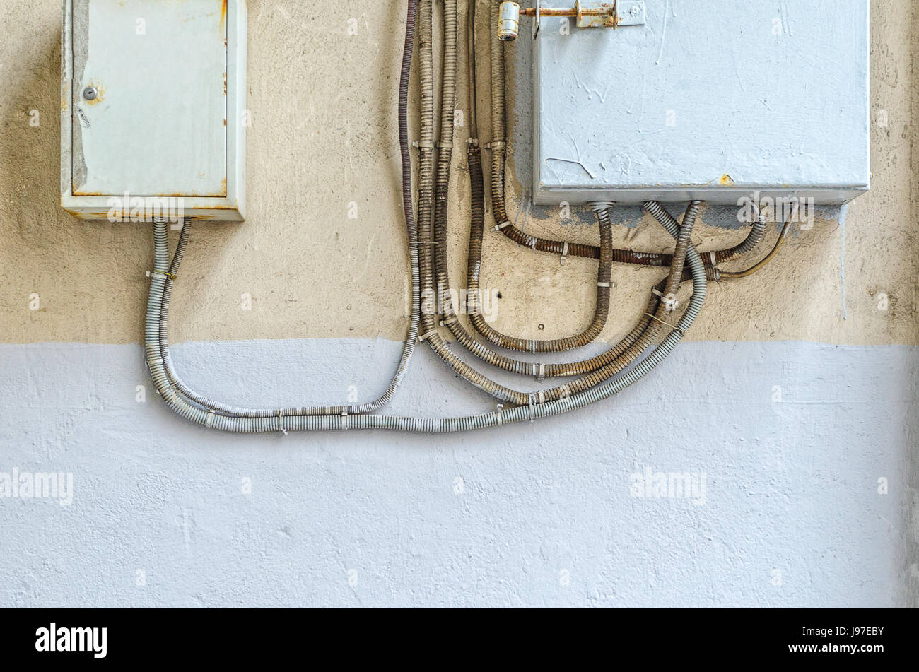 Electrical switchboard on the wall. Wiring to the electrical panel on