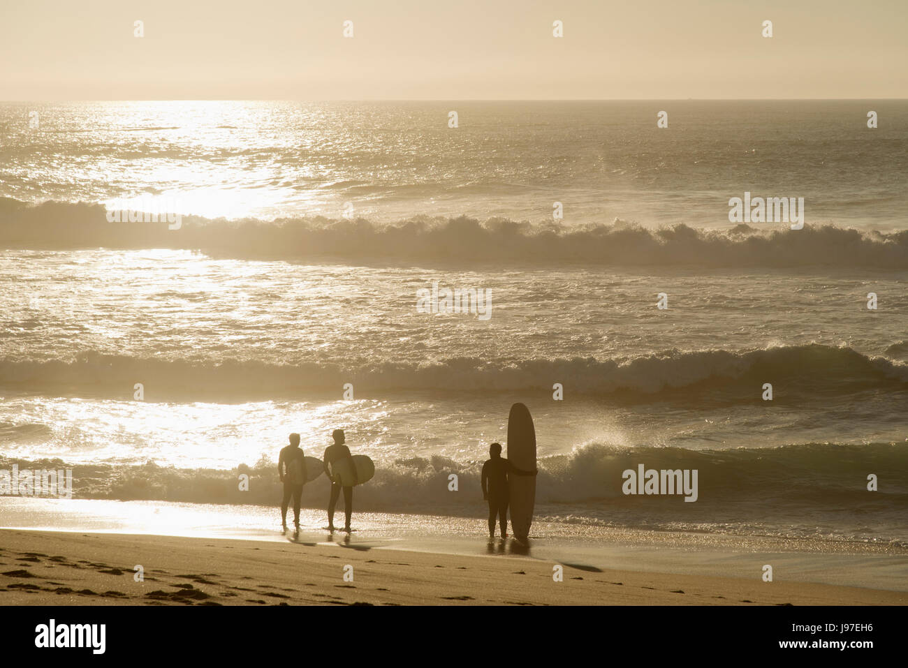 Surfers in Ericeira, Portugal Stock Photo