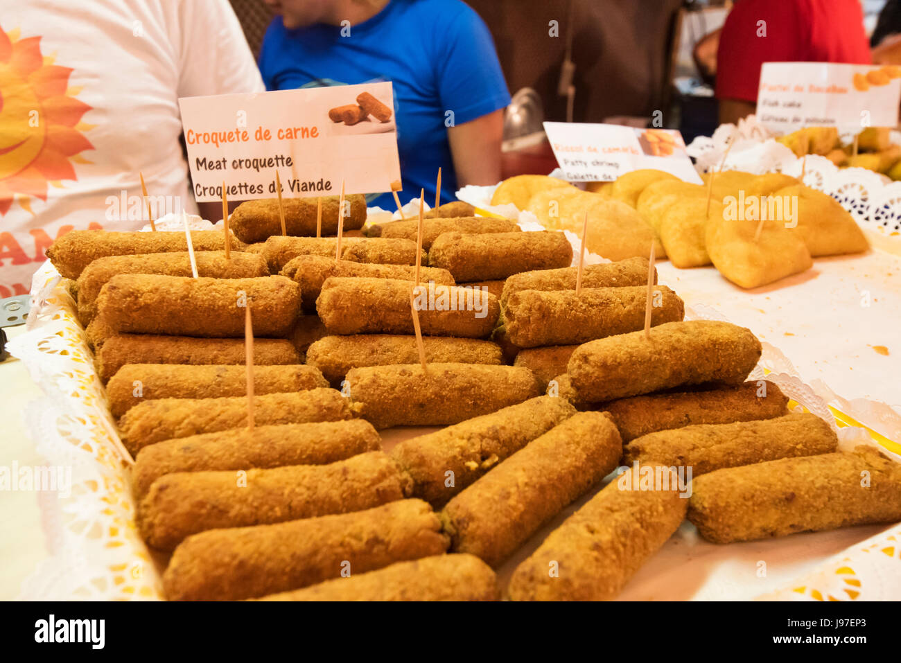 Croquetes (beef croquettes), a delicacy, at the popular Santo Antonio festivities in Alfama district. Lisbon, Portugal Stock Photo