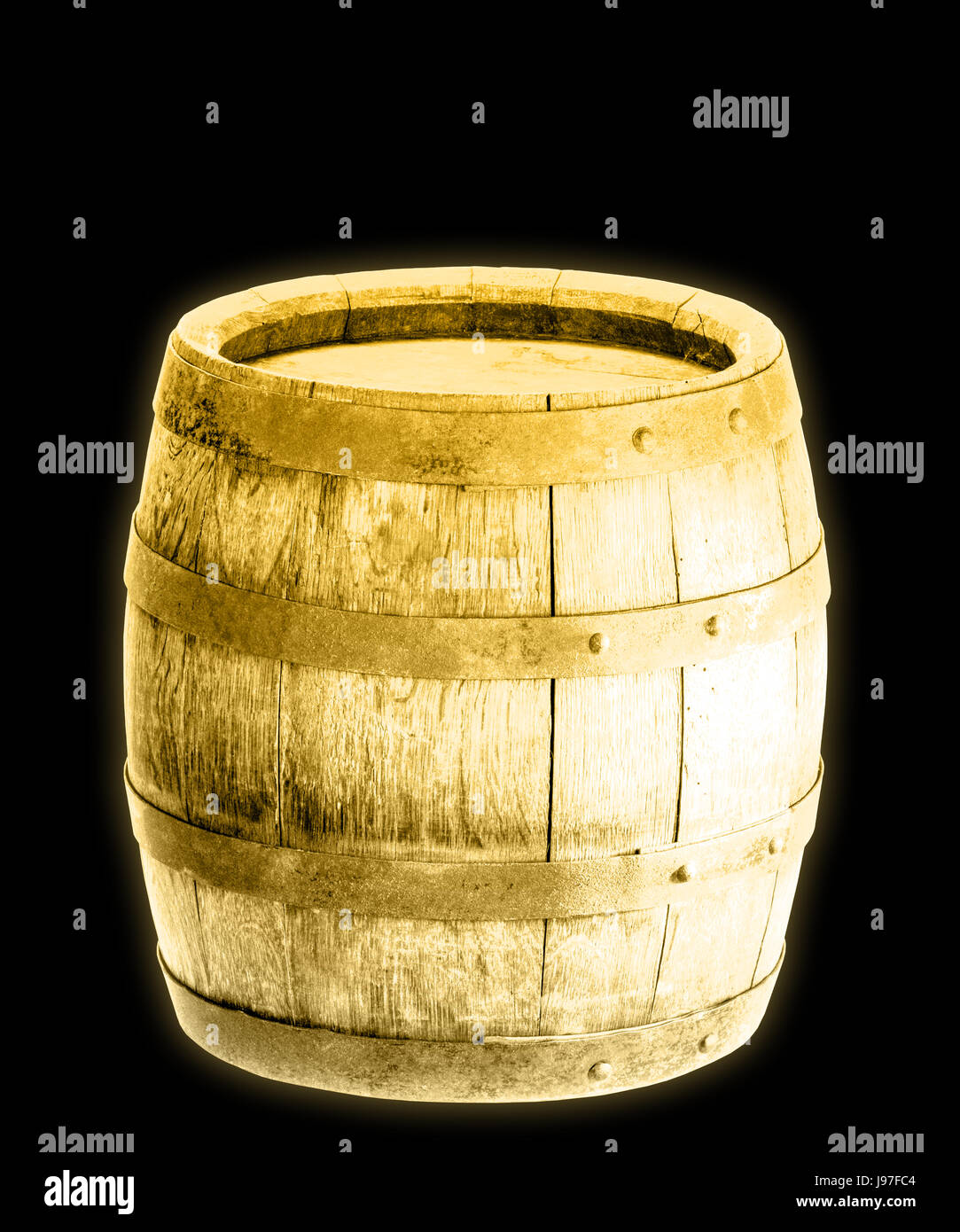 Gold barrel isolated against the black background Stock Photo