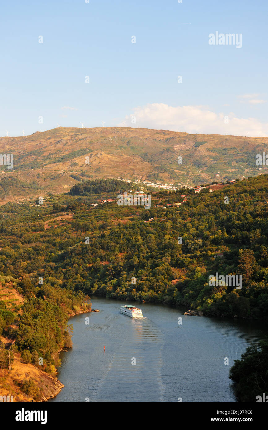 The Douro river and a hotel-ship near Resende and Montemuro mountains, Portugal Stock Photo
