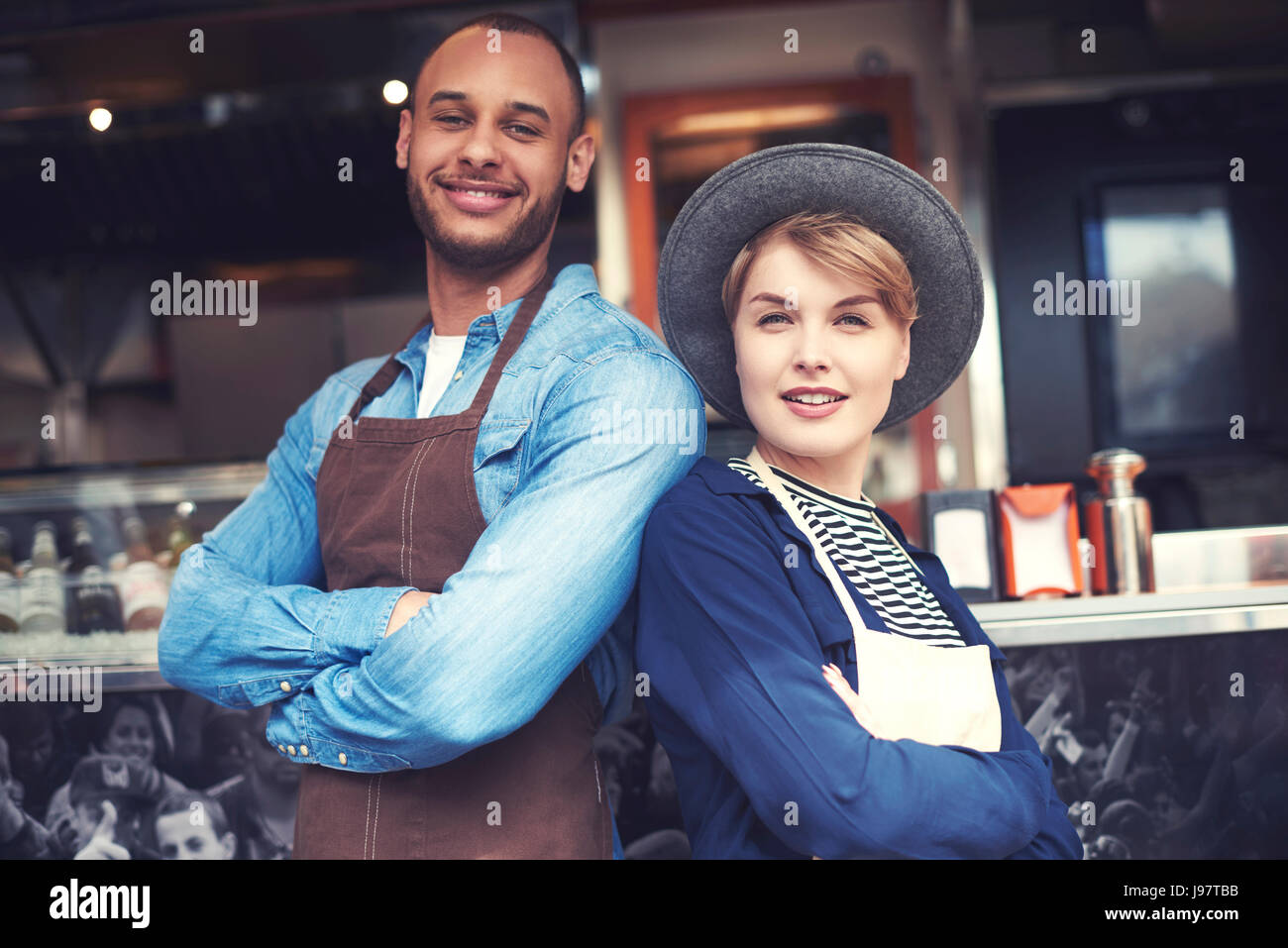 Portrait of couple selling food on the street Stock Photo Alamy
