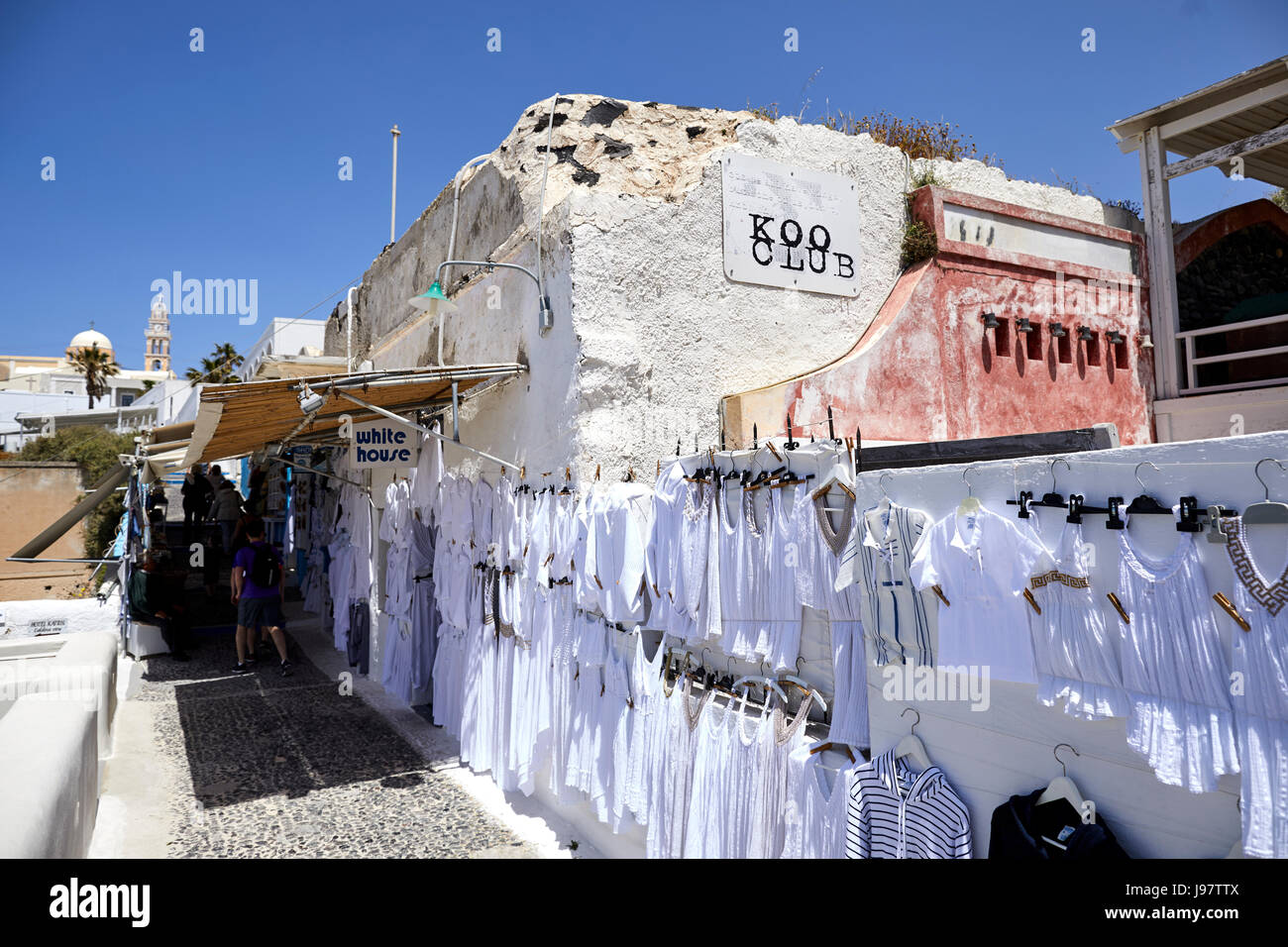 Volcanic Greek island Santorini one of the Cyclades islands in the Aegean Sea. Fira the islands capital whit clothing shop Stock Photo