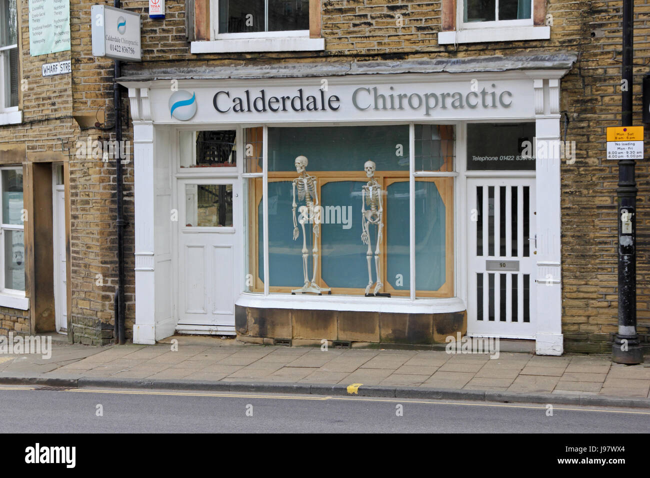 Calderdale Chiropractic, with skeletons in window,  Sowerby Bridge Stock Photo