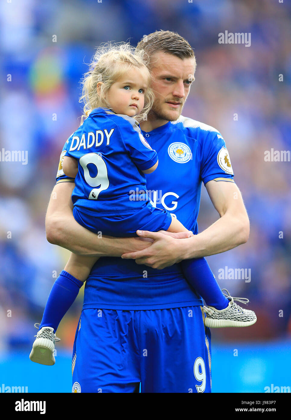 Leicester Citys Jamie Vardy with family on the pitch after the Premier League match at the King Power Stadium, Leicester Stock Photo