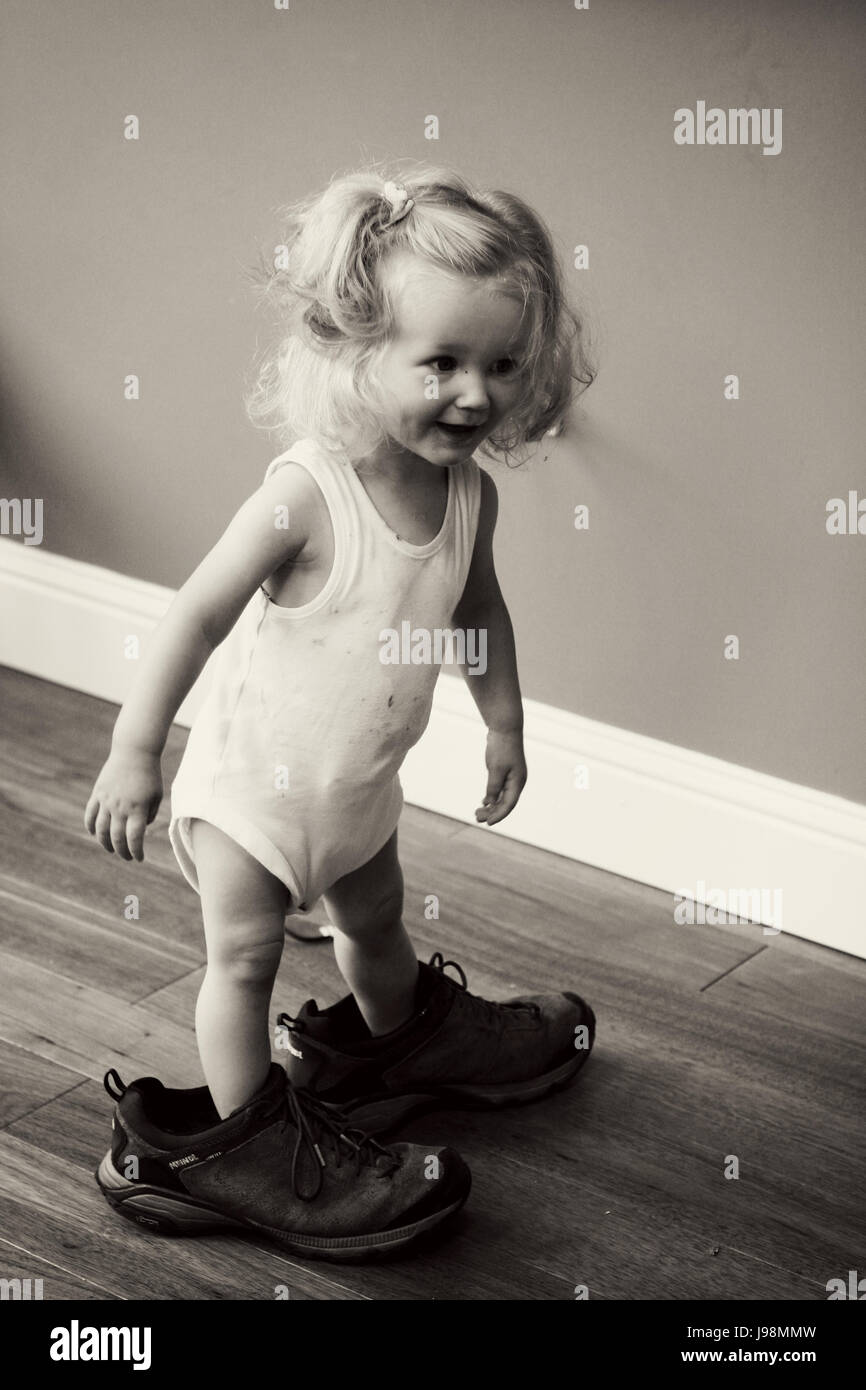 Wearing daddys shoes hi-res stock photography and images - Alamy