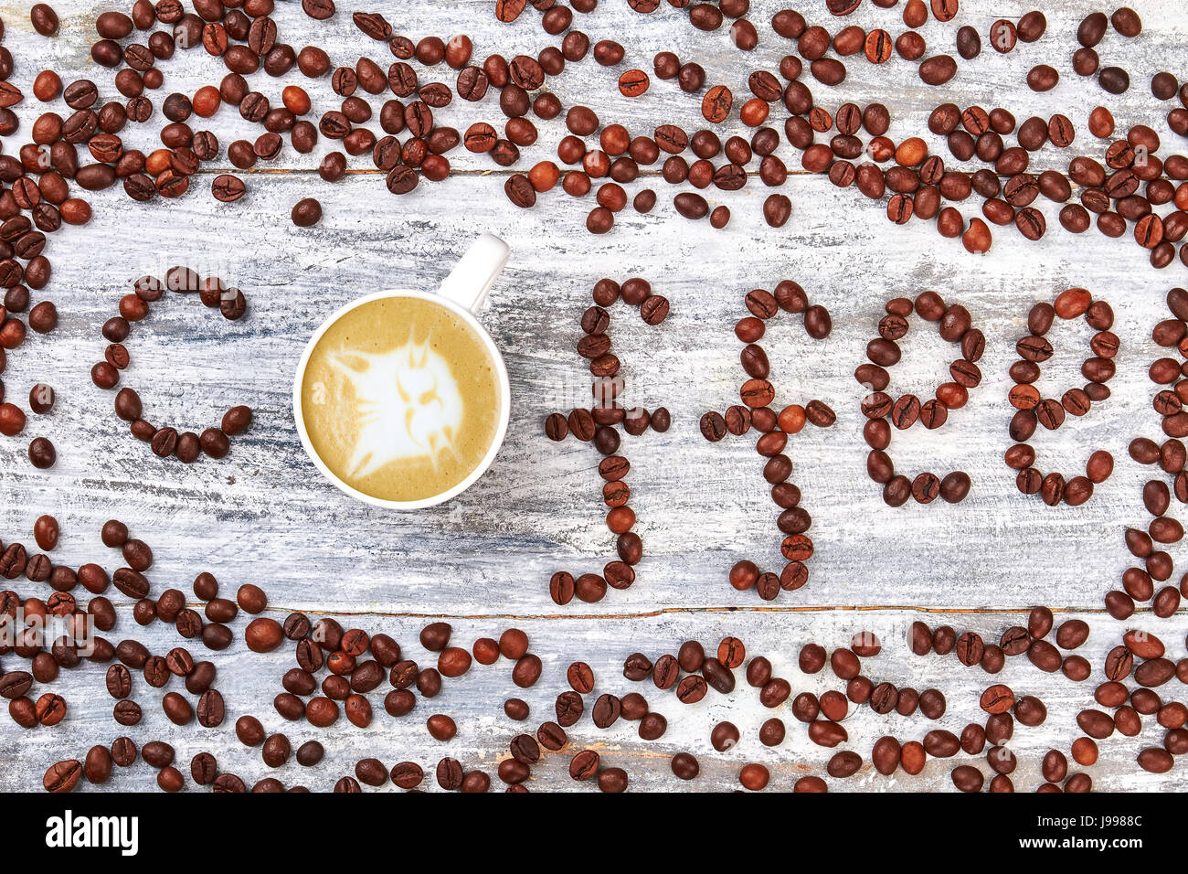 Coffee beans on wooden background. Stock Photo