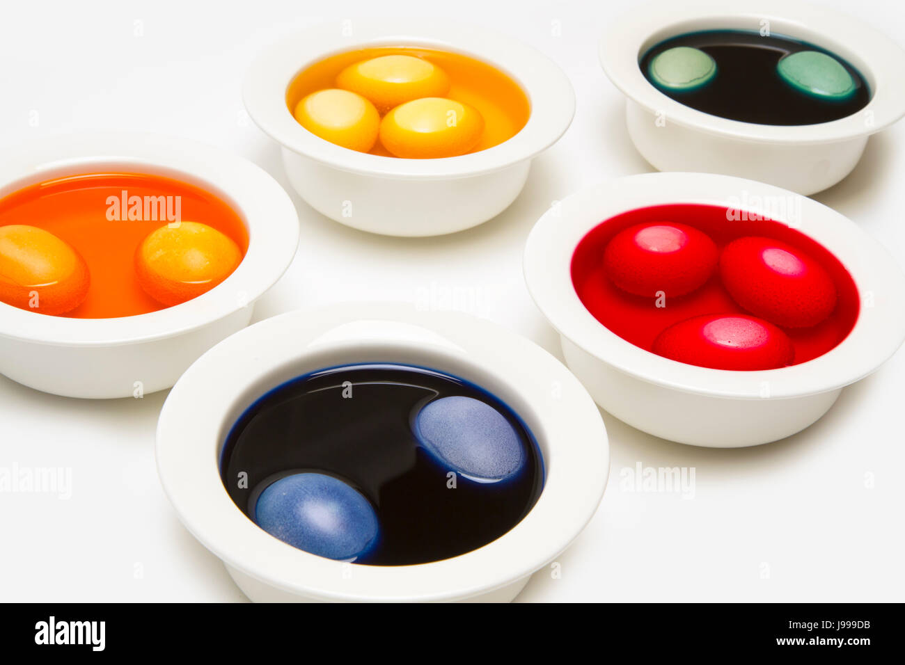 bowls with dyed easter eggs Stock Photo