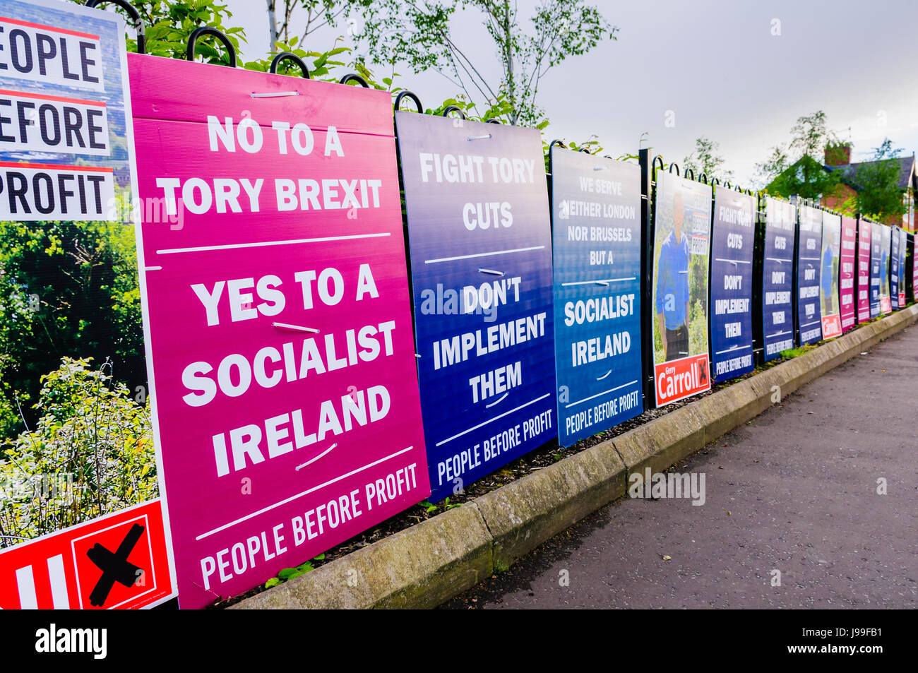 Election posters belonging to People Before Profit calling for a Socialist Ireland and to say 'No to Tory Brexit' and 'Fight Tory Cuts.  Don't impleme Stock Photo