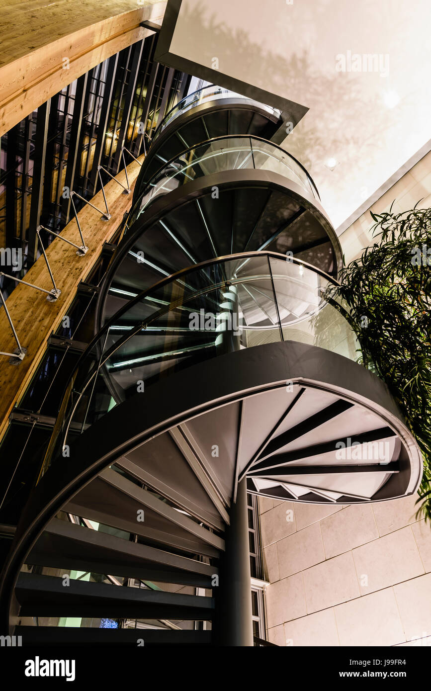 Spiral staircase and handrail in a hotel. Stock Photo